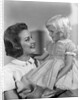 1960s Mother Holding Little Blond Girl Wearing Fancy Dress In Her Arms Looking At Each Other by Anonymous