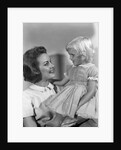 1960s Mother Holding Little Blond Girl Wearing Fancy Dress In Her Arms Looking At Each Other by Anonymous