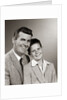 1950s Studio Portrait Smiling Man Father And Boy Son Sitting Together Looking At Camera by Anonymous