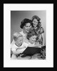 1950s Portrait Mother Two Daughters And Son Reading Book Together by Anonymous