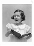 1930s Little Brunette Girl Singing Holding Songbook by Anonymous