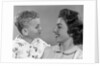 1950s Mother And Son Looking At Each Other Studio by Anonymous