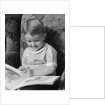 1930s 1940s Little Boy Sitting On Chair Reading Picture Book by Anonymous