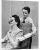 1930s 1940s Boy Son Surprising Woman Mother With Gift Wrapped Present by Anonymous