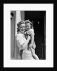 1940s Portrait Woman Mother Holding Girl Daughter Smiling Looking At Camera by Anonymous