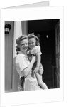 1940s Portrait Woman Mother Holding Girl Daughter Smiling Looking At Camera by Anonymous