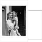 1940s Portrait Woman Mother Holding Girl Daughter Smiling Looking At Camera by Anonymous