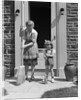 1940s Mother And Daughter Sweeping Sidewalk In Front Of Home by Anonymous