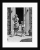1940s Mother And Daughter Sweeping Sidewalk In Front Of Home by Anonymous