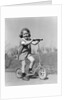 1930s Smiling Girl Playing On Scooter On Sidewalk Looking At Camera by Anonymous