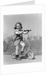 1930s Smiling Girl Playing On Scooter On Sidewalk Looking At Camera by Anonymous