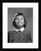 1950s Girl Page Boy Hair Bangs Smiling Funny Facial Expression Looking At Camera by Anonymous