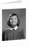1950s Girl Page Boy Hair Bangs Smiling Funny Facial Expression Looking At Camera by Anonymous