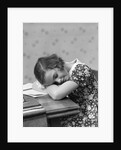 1930s Teenage Girl Sleeping Head Resting On Table Desk While Studying by Anonymous