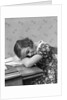 1930s Teenage Girl Sleeping Head Resting On Table Desk While Studying by Anonymous