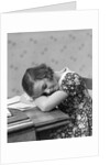 1930s Teenage Girl Sleeping Head Resting On Table Desk While Studying by Anonymous