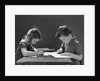 1940s Boy And Girl Sitting At Table Coloring In Books by Anonymous