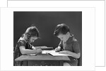 1940s Boy And Girl Sitting At Table Coloring In Books by Anonymous