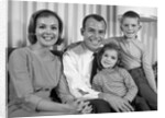 1960s Smiling Family Portrait Mother Father Son Daughter Looking At Camera by Anonymous