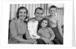1960s Smiling Family Portrait Mother Father Son Daughter Looking At Camera by Anonymous