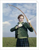 1960s 1970s Sports Woman Archer Holding Bow Preparing To Draw Arrow by Anonymous