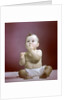 1940s 1950s Baby Diaper Sitting Looking Up Fingers In Mouth by Anonymous