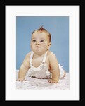 1960s Baby Making Funny Face Pushed Up On Arms Crawling Forward by Anonymous