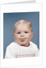1960s Portrait Of Cute Blond Chubby Baby Looking At Camera Sticking Out Tongue by Anonymous