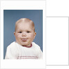 1960s Portrait Of Cute Blond Chubby Baby Looking At Camera Sticking Out Tongue by Anonymous