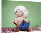 1960s Serious Baby In Chef Hat With Mixing Bowl And Spoon by Anonymous