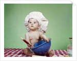 1960s Serious Baby In Chef Hat With Mixing Bowl And Spoon by Anonymous