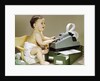 1960s Smiling Accountant Office Worker Baby Wearing Cloth Diaper Sitting In Chair Using Adding Machine Calculator by Anonymous