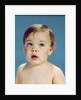 1960s Baby With Uncertain Facial Expression Deep Blue Eyes Looking Guilty Up And To The Side by Anonymous