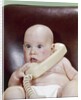 1960s Chubby Baby Sitting In Leather Office Chair Talking On Telephone by Anonymous