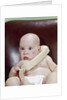1960s Chubby Baby Sitting In Leather Office Chair Talking On Telephone by Anonymous