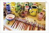 Paint brushes and colored paints by Anonymous