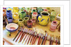 Paint brushes and colored paints by Anonymous
