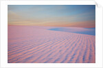 Sunset and patterns in snow covered wheat fields by Anonymous