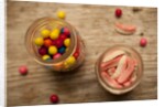 Bubble gum balls and teeth candy in mason jars by Anonymous