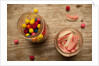 Bubble gum balls and teeth candy in mason jars by Anonymous