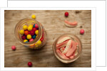 Bubble gum balls and teeth candy in mason jars by Anonymous
