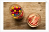 Bubble gum balls and teeth candy in mason jars by Anonymous
