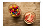 Bubble gum balls and teeth candy in mason jars by Anonymous