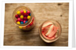 Bubble gum balls and teeth candy in mason jars by Anonymous