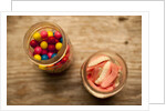 Bubble gum balls and teeth candy in mason jars by Anonymous