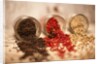 Black, red, and white pepper corns in rustic mason jars by Anonymous