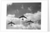 1950s three B-52 bomber airplanes in flight formation by Anonymous