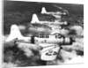 1940s three World War II US navy dive bombers flying in formation by Anonymous