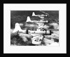 1940s three World War II US navy dive bombers flying in formation by Anonymous