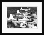 1940s three World War II US navy dive bombers flying in formation by Anonymous